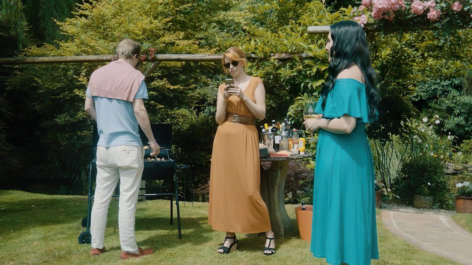 People enjoying a summer barbeque from the short thriller film A Friend in Need
