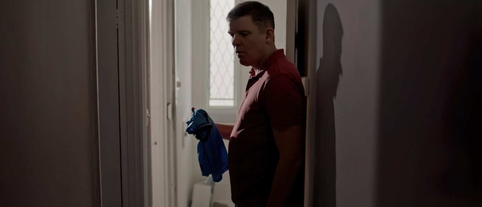 A man in a hallway, from short film Sad Pretty Pictures